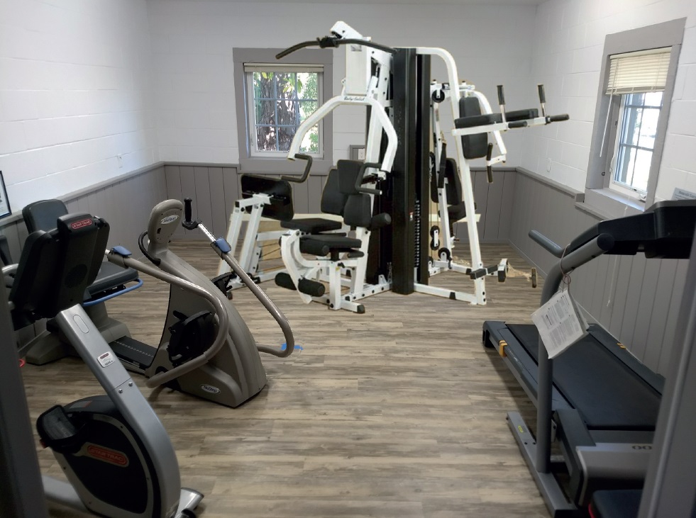 Exercise Room with Treadmill, Recumbent Bike, Elliptical Bike, Hand Weights & Lat Pulldown